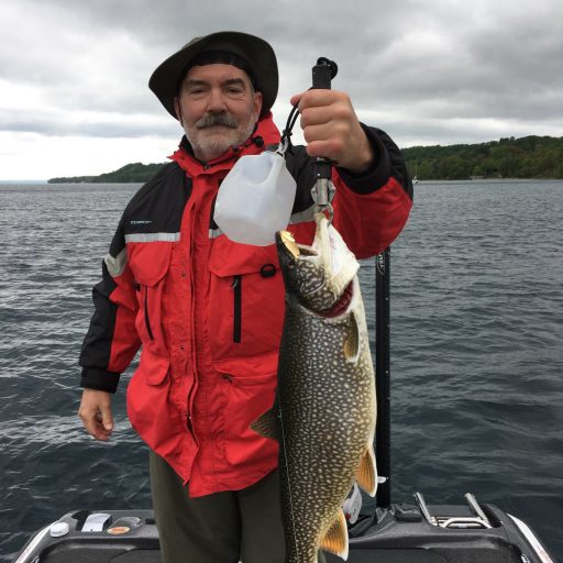 Dan owner of jacks sport shop with a nice lake trout